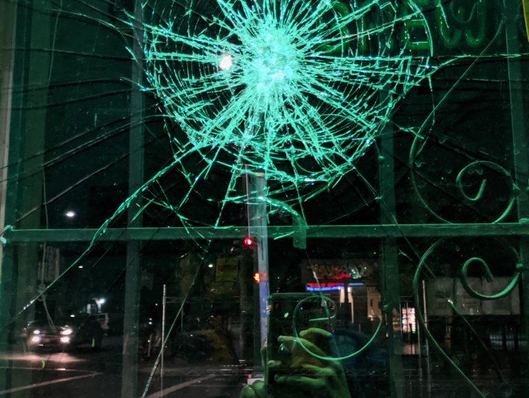 Photo of broken glass window